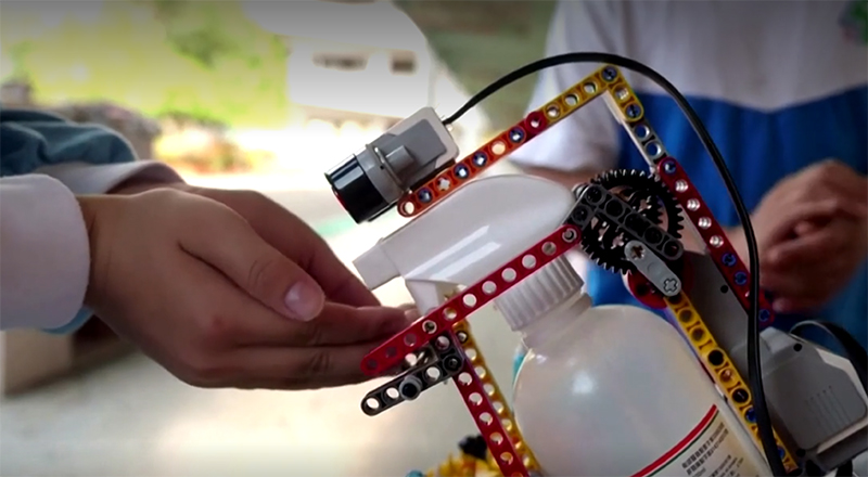 School children design anti-coronavirus LEGO disinfectant dispenser